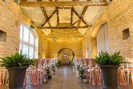 the interior of Lapstone Cotswold barn with fairy lights