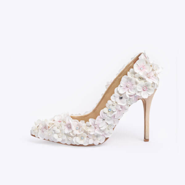 an ivory floral wedding shoe - side view with pearl and diamante detail
