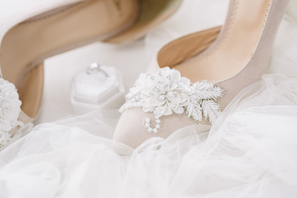 pink wedding shoes with ivory beaded detail on the toes